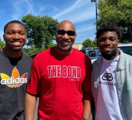Kevin Lyles with his sons Noah Lyles and Josephus Lyles.